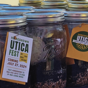 Homegrown Utica Fest publicity on Ball jars with seedlings